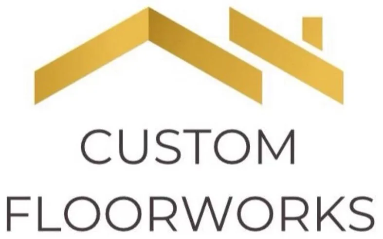 Custom Floorworks logo with gold geometric roofline icon and bold dark grey wordmark